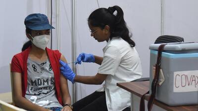 A beneficiary gets inoculated against Covid-19 at a vaccination centre, at Malad, in Mumbai on Wednesday. (Vijay Bate/ HT Photo) A beneficiary gets inoculated against Covid-19 at a vaccination centre, at Malad, in Mumbai on Wednesday. (Vijay Bate/ HT Photo)