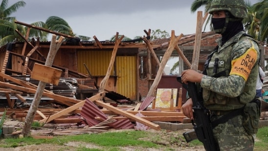 A soldier stands in an area damaged in the aftermath of Hurricane Agatha, in San Isidro del Palmar, Oaxaca state, Mexico, on May 31, 2022.&nbsp;(Reuters photo)