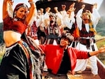 Malaika Arora and Shah Rukh Khan dance on top of a train in Chaiyya Chaiyya. Malaika Arora and Shah Rukh Khan dance on top of a train in Chaiyya Chaiyya.