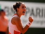 Martina Trevisan clenches her fist after scoring a point against Coco Gauff during their semifinal match at the French Open Martina Trevisan clenches her fist after scoring a point against Coco Gauff during their semifinal match at the French Open
