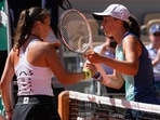 Poland's Iga Swiatek, right, is congratulated by Russia's Daria Kasatkina&nbsp;