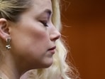 Actor Amber Heard waits before the verdict was read at the Fairfax County Circuit Courthouse in Fairfax.(AP) Actor Amber Heard waits before the verdict was read at the Fairfax County Circuit Courthouse in Fairfax.(AP)