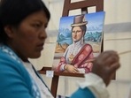 Claudia Callizaya, 32, a Bolivian painter known as Claudina, works on cholita-style Mona Lisa painting, at the El Alto Public University, in El Alto, Bolivia May 21, 2022. Picture taken May 21, 2022. (REUTERS/Claudia Morales) Claudia Callizaya, 32, a Bolivian painter known as Claudina, works on cholita-style Mona Lisa painting, at the El Alto Public University, in El Alto, Bolivia May 21, 2022. Picture taken May 21, 2022. (REUTERS/Claudia Morales)