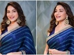Madhuri Dixit displays her timeless grace in blue saree and sleeveless blouse for new pics: Check out here Madhuri Dixit displays her timeless grace in blue saree and sleeveless blouse for new pics: Check out here