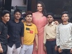Saisha Shinde poses with trans men at a LGBTQ+ organisation in Mumbai.