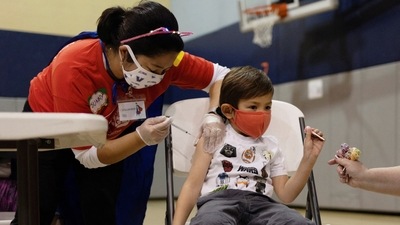 FILE PHOTO: Andrew Antoniewicz, 5, receives the Pfizer-BioNTech coronavirus disease vaccine in Lansdale, Pennsylvania, U.S. (REUTERS)