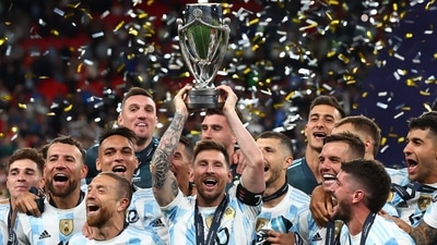 Argentina's Lionel Messi celebrates with the trophy and teammates after winning the Finalissima (REUTERS)