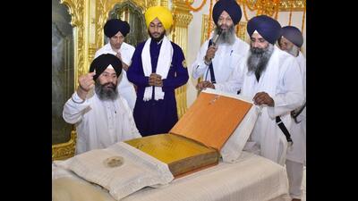 The bir will be put up on display daily from morning to evening till June 5. The arrangement has been made for the “sangat” to see the bullet that had hit this holy “saroop”. The bir was struck by a bullet during the Op Bluestar in 1984. (Sameer Sehgal/HT)