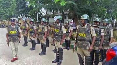Police personnel stand guard in Hassan district, where a Janata Dal (Secular) leader was killed. (Agencies) Police personnel stand guard in Hassan district, where a Janata Dal (Secular) leader was killed. (Agencies)