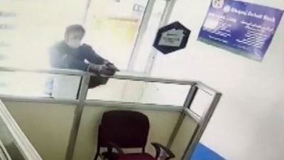 Video of the shooting inside the Ellaquai Dehati Bank in Jammu and Kashmir's Kulgam was shared by news agency ANI (Credit: ANI) Video of the shooting inside the Ellaquai Dehati Bank in Jammu and Kashmir's Kulgam was shared by news agency ANI (Credit: ANI)