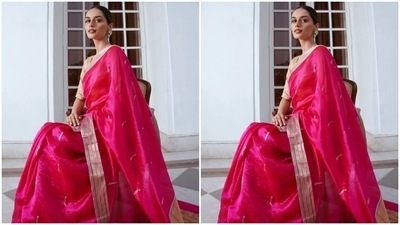 For the occasion, Manushi draped herself in a fuchsia pink saree from the heritage clothing label, Madhurya. The star paired the six yards with a cream-coloured half-sleeve silk blouse featuring a wide neckline. Manushi's ensemble is a perfect pick for low-key events where you want to embrace minimalism and still look incredible. (Instagram) For the occasion, Manushi draped herself in a fuchsia pink saree from the heritage clothing label, Madhurya. The star paired the six yards with a cream-coloured half-sleeve silk blouse featuring a wide neckline. Manushi's ensemble is a perfect pick for low-key events where you want to embrace minimalism and still look incredible. (Instagram)