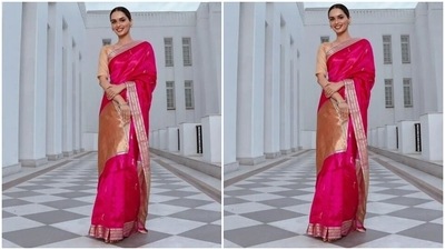 The elegant silk saree comes with minimal handcrafted embroidery. It features gold patti borders with blue lining, intricate thread embroidery in the same shades and broad golden borders on the pallu. The beauty queen draped the six yards in the traditional style around her body, allowing the pallu to fall from her shoulder. (Instagram) The elegant silk saree comes with minimal handcrafted embroidery. It features gold patti borders with blue lining, intricate thread embroidery in the same shades and broad golden borders on the pallu. The beauty queen draped the six yards in the traditional style around her body, allowing the pallu to fall from her shoulder. (Instagram)