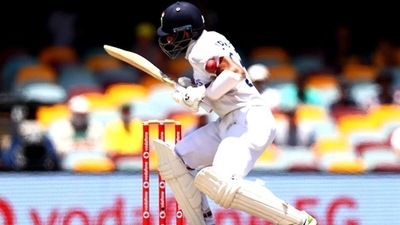 Cheteshwar Pujara cops a blow to his arm (Getty) Cheteshwar Pujara cops a blow to his arm (Getty)