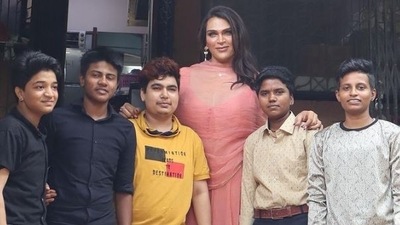 Saisha Shinde poses with trans men at a LGBTQ+ organisation in Mumbai.