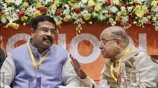Union education minister Dharmendra Pradhan with National Curriculum Frameworks (NCF) panel chairperson K Kasturirangan during the National Conference of School Education Ministers, in Gandhinagar (PTI)
