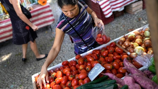 Independent vegetable shops are now pricing tomatoes at around Rs. 90 a kilogram in the Karnataka capital. (AP Photo/Silvia Izquierdo) (Image for representation only)(AP)