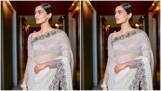 Earlier, Manushi had dropped another set of pictures of herself dressed in a saree. She chose an embellished ivory sheer saree and matching embroidered blouse, teamed with a sleek bun, minimal accessories and dewy glam.(Instagram)