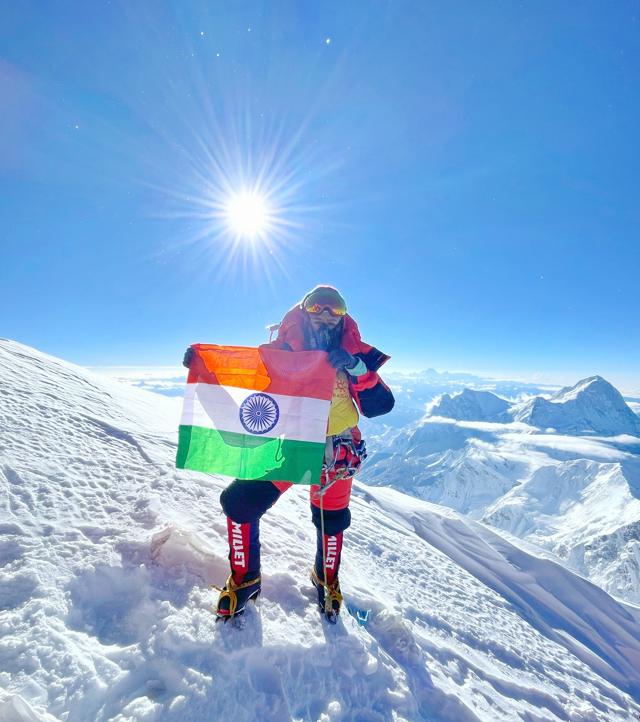 Prakriti Varshney at the summit of Mount Everest with the Indian National flag Prakriti Varshney at the summit of Mount Everest with the Indian National flag