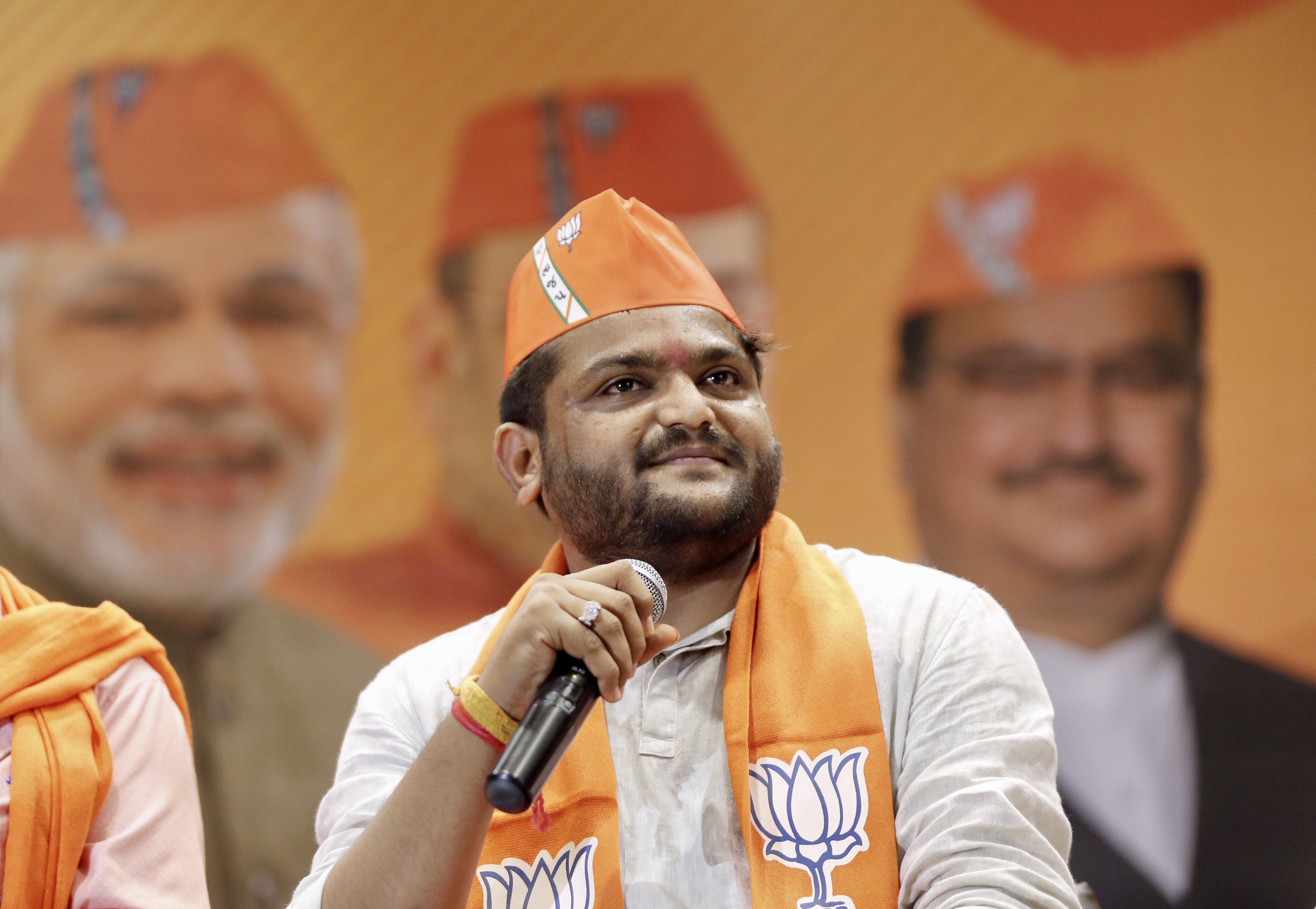 Hardik Patel looks on as he joins the BJP at the party office Kamalam, in Gandhinagar, on June 2, 2022. (PTI photo) Hardik Patel looks on as he joins the BJP at the party office Kamalam, in Gandhinagar, on June 2, 2022. (PTI photo)