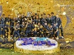 Gujarat Titans players with the IPL trophy after winning the final T20 cricket match of the Indian Premier League 2022 (PTI) Gujarat Titans players with the IPL trophy after winning the final T20 cricket match of the Indian Premier League 2022 (PTI)