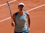 Poland's Iga Swiatek celebrates winning her semi final match against Russia's Daria Kasatkina