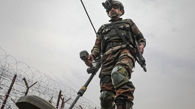 Indian Army soldiers patrol near the Line of Control in Akhnoor sector of J&K (PTI) Indian Army soldiers patrol near the Line of Control in Akhnoor sector of J&K (PTI)