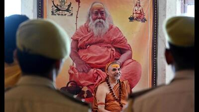 Police and administration officials request Swami Avimukteshwaranand not to offer prayers at the ‘Shivling’ in the Gyanvapi complex, in Varanasi on Friday. Avimukteshwaranand Saraswati has said that he and other scholars will on June 4 offer prayers at the ‘Shivling’ claimed to have been found in the Gyanvapi complex. (PTI Photo) Police and administration officials request Swami Avimukteshwaranand not to offer prayers at the ‘Shivling’ in the Gyanvapi complex, in Varanasi on Friday. Avimukteshwaranand Saraswati has said that he and other scholars will on June 4 offer prayers at the ‘Shivling’ claimed to have been found in the Gyanvapi complex. (PTI Photo)