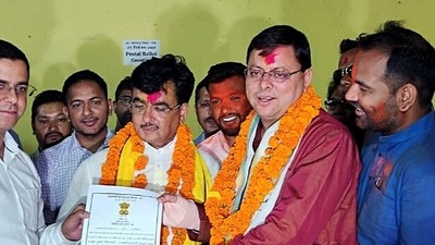 Champawat, June 03 (ANI): Uttarakhand Chief Minister Pushkar Singh Dhami receives his victory certificate after winning in Champawat Assembly by-elections, on Friday. (ANI Photo/ ANI Pic Service) Champawat, June 03 (ANI): Uttarakhand Chief Minister Pushkar Singh Dhami receives his victory certificate after winning in Champawat Assembly by-elections, on Friday. (ANI Photo/ ANI Pic Service)