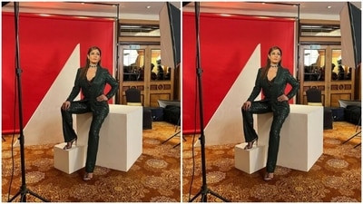 Raveena teamed a laced black bra with a dark mossy green sequined blazer and a pair of formal trousers of the same colour. (Instagram/@officialraveenatandon)