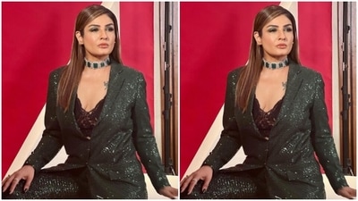 In a silver choker embedded with emerald stones and multiple silver rings, Raveena further accessorised her look for the day. (Instagram/@officialraveenatandon)