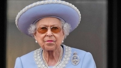 Queen Elizabeth II stands on the balcony of Buckingham Palace, London. (AP)