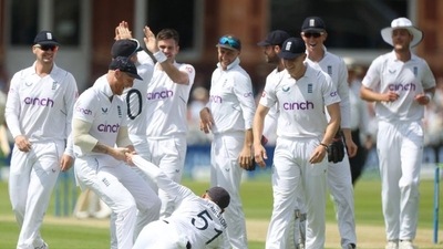 England's Jonny Bairstow celebrates with Ben Stokes and teammates after taking a catch to dismiss New Zealand's Tom Latham off the bowling of James Anderson Action (Action Images via Reuters)