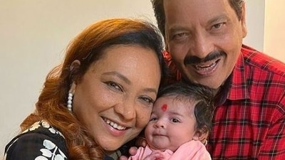 Udit Narayan poses with grand daughter Tvisha.