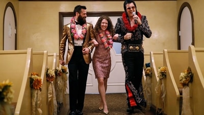 Elvis impersonator walks down the aisle during a wedding ceremony at the Graceland Wedding Chapel in Las Vegas. (AP) Elvis impersonator walks down the aisle during a wedding ceremony at the Graceland Wedding Chapel in Las Vegas. (AP)