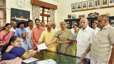 **EDS: RPT, REMOVES BYLINE (IMAGE PROVIDED BY CM OFFICE)** Bengaluru: Union Finance Minister Nirmala Sitharaman files nomination papers for Rajya Sabha elections in the presence of Karnataka CM Basavaraj Bommai, BS Yediyurappa and others, at Vidhanasoudha in Bengaluru, Tuesday, May 31, 2022. (PTI Photo) (PTI05_31_2022_000042B) (PTI)