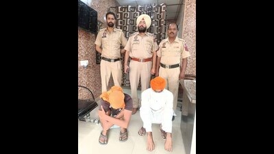 The man-son duo accused of being involved in the bone selling racket in custody of Khanna police. (HT Photo)
