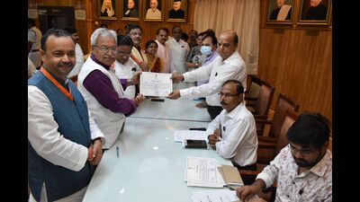 BJP candidates declared elected unopposed for RS receiving their certificates from RS returning officer Brij Bhushan Dubey on Friday. (Sourced)