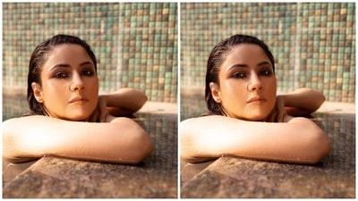 Shehnaaz slipped into a sleeveless swimsuit for the glamorous photoshoot. With bold kohl-lined eyes, subtle smoky eye shadow, nude lip shade, mascara on the lashes, on-fleek brows and nude-palette makeup, Shehnaaz rounded off the glam picks. In the end, Shehnaaz left her tresses open in a sleeked back style and side parting. (Instagram) Shehnaaz slipped into a sleeveless swimsuit for the glamorous photoshoot. With bold kohl-lined eyes, subtle smoky eye shadow, nude lip shade, mascara on the lashes, on-fleek brows and nude-palette makeup, Shehnaaz rounded off the glam picks. In the end, Shehnaaz left her tresses open in a sleeked back style and side parting. (Instagram)