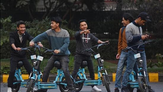New Delhi, India - Feb. 22, 2020: People seen riding Yulu Bikes battery powered electric vehicles at Janpath in New Delhi, India, on Saturday, February 22, 2020. (Photo by Sanchit Khanna/ Hindustan Times) **To go with Baishali's story** (Sanchit Khanna/HT PHOTO)