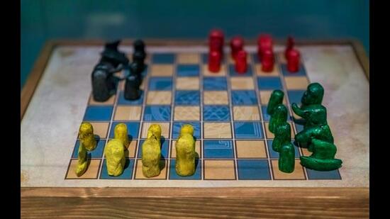 Antique Chaturanga game board with pieces. (Shutterstock)