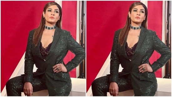 Raveena decked up in green and silver eyeshadow, black eyeliner, black kohl, mascara-laden eyelashes, drawn eyebrows, contoured cheeks and a shade of nude lipstick.(Instagram/@officialraveenatandon)