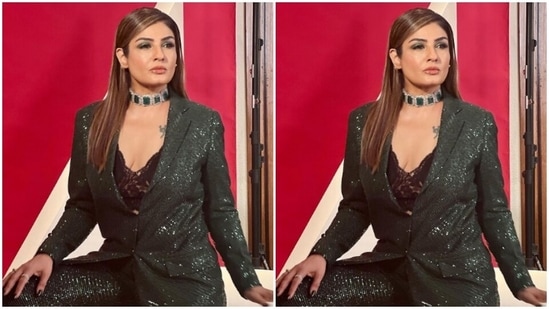 In a silver choker embedded with emerald stones and multiple silver rings, Raveena further accessorised her look for the day.(Instagram/@officialraveenatandon)