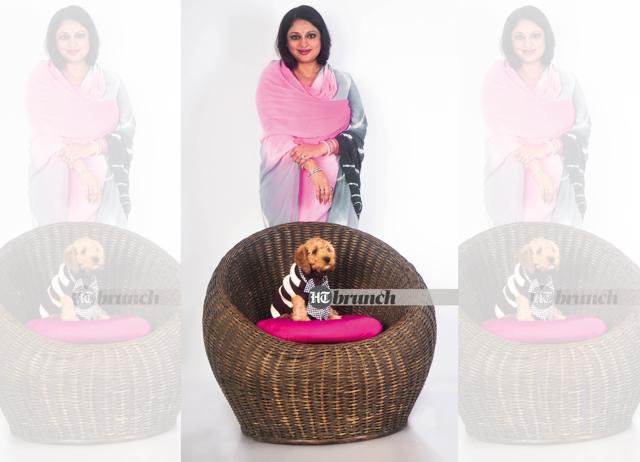 Nandini with dusty; On Nandini: Saree by Tayab Leharia; On Dusty, the Cockapoo: Jumper & bow tie by Mutt Of Course (Ayushman Mitra)