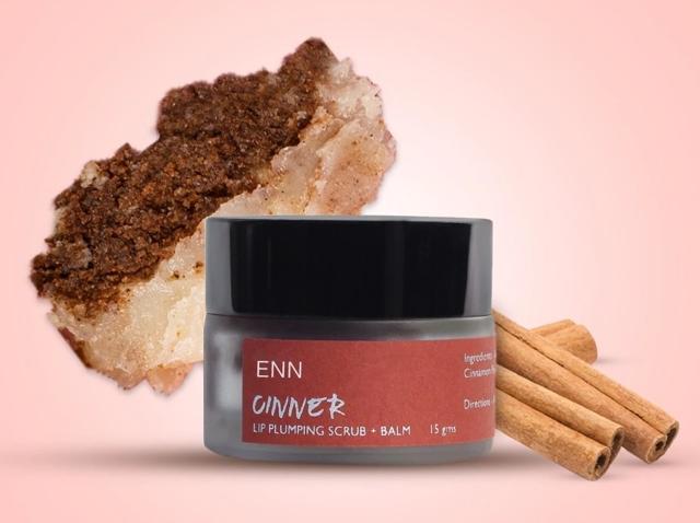This lip plumping balm & scrub duo exfoliates with brown sugar, cinnamon, bees wax, shea butter, and vanilla essential oil (ENN) This lip plumping balm & scrub duo exfoliates with brown sugar, cinnamon, bees wax, shea butter, and vanilla essential oil (ENN)