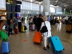 Passengers queue at check-in desks at Malaga-Costa del Sol Airport, in Malaga, Spain June 4, 2022.&nbsp;(REUTERS/Jon Nazca)