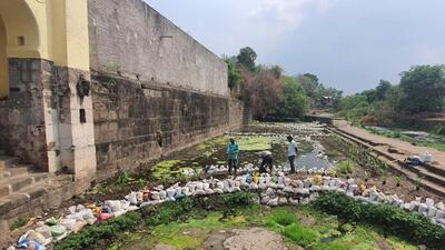 The moon-shaped semicircular reed bed at the Someshwar temple at Pashan. This was created with an aim to clean the water at the temple. (HT PHOTO) The moon-shaped semicircular reed bed at the Someshwar temple at Pashan. This was created with an aim to clean the water at the temple. (HT PHOTO)