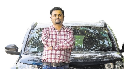 Ashwin Varkey with his Tata Nexon EV.