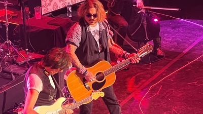 Johnny Depp joins musician Jeff Beck on stage during a concert, in Gateshead, Britain on June 2. (Lianne Templeman/via Reuters) (Lianne Templeman via REUTERS)