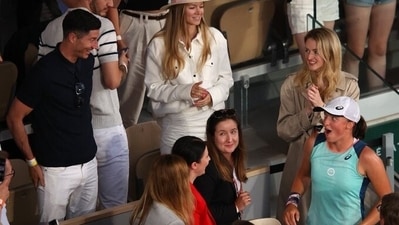 Iga Swiatek and Robert Lewandowski at Roland Garros (Twitter/WTA) Iga Swiatek and Robert Lewandowski at Roland Garros (Twitter/WTA)