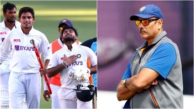 Indian players after the victory in Gabba Test; Ravi Shastri (AP) Indian players after the victory in Gabba Test; Ravi Shastri (AP)